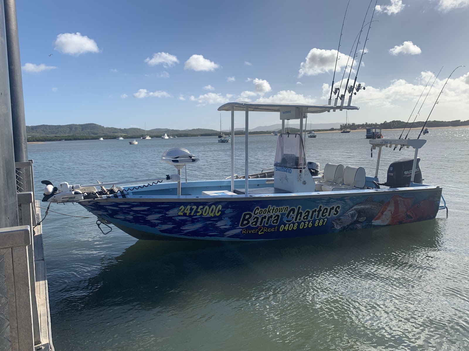 The Cooktown Barra Charters boat moored on the Endeavour River