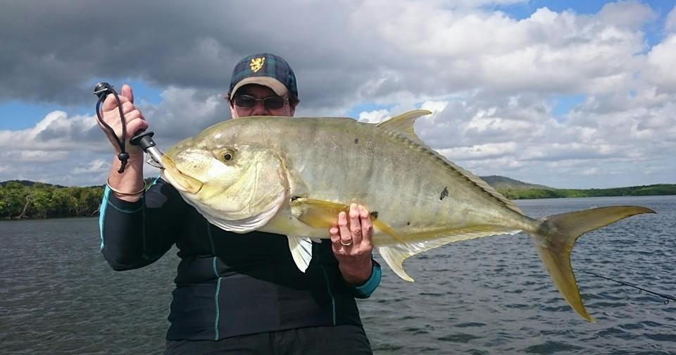 A golden trevally caught on the river
